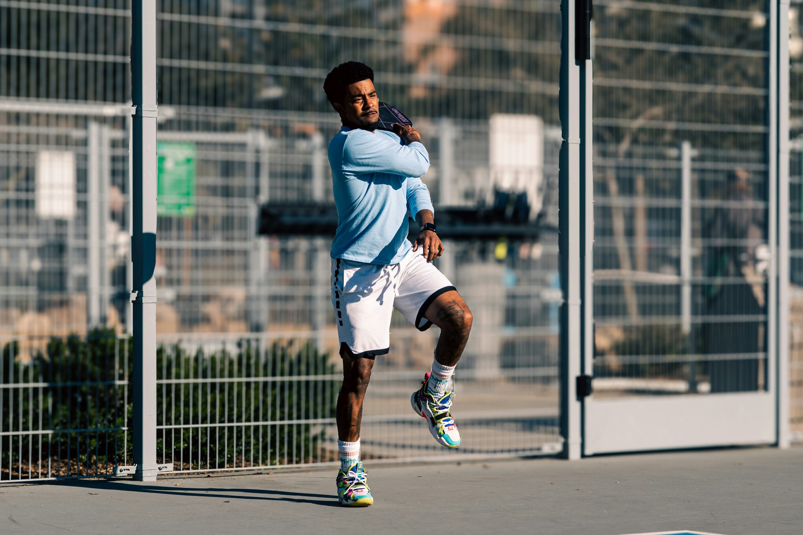 pickleball player showing the best pickleball paddle for tennis elbow