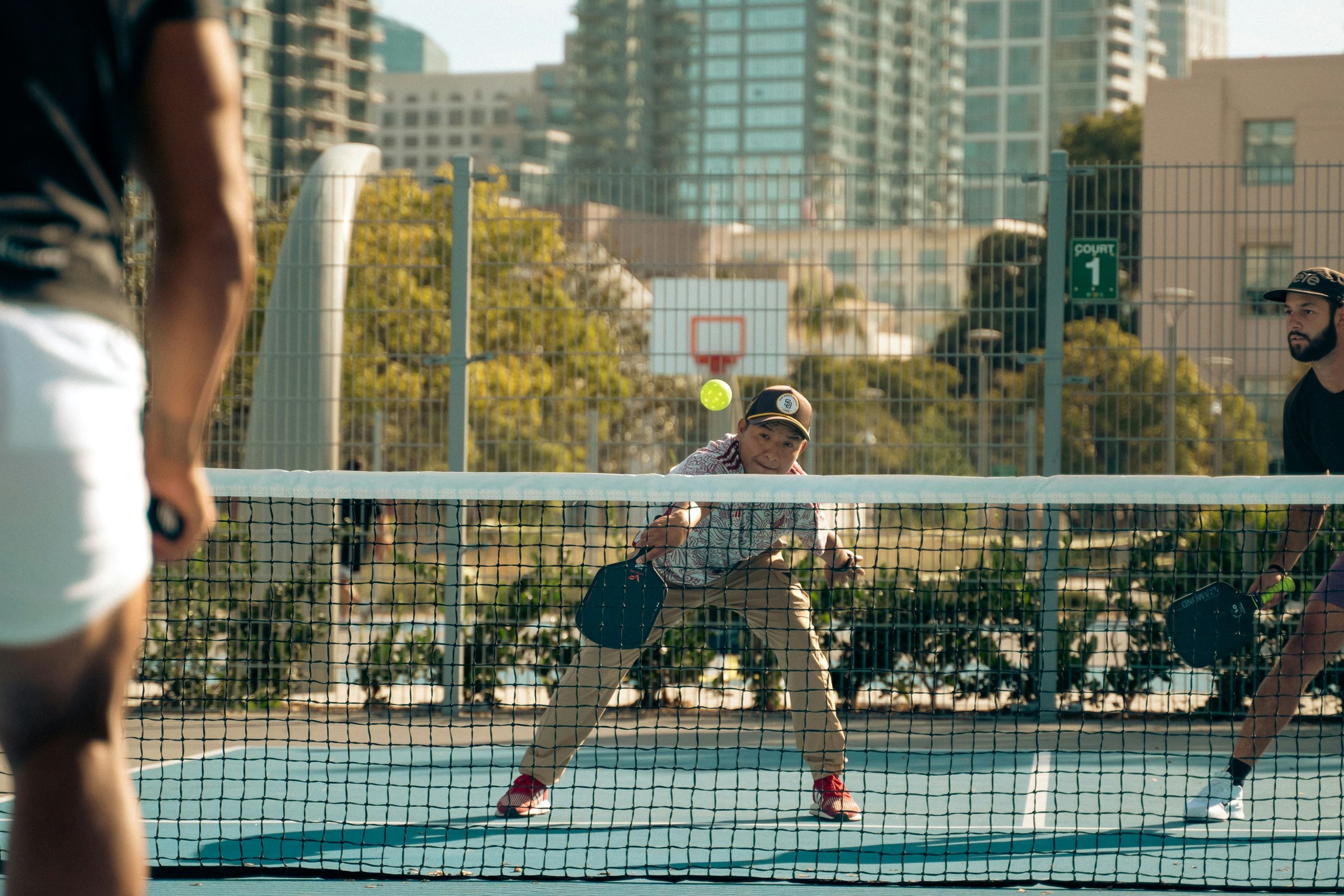 returning serves using the best pickleball paddles for seniors