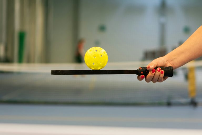 Holding and testing pickleball paddles for small hands